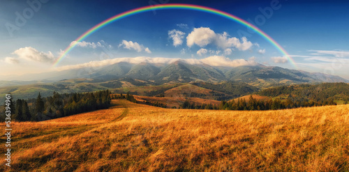 Rainbow over the Mountains. autumn morning in the Carpathians. Nature of Ukraine