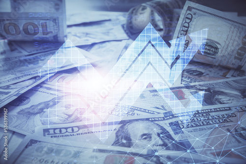 Double exposure of grow arrows drawing over usa dollars bill background. Concept of success.
