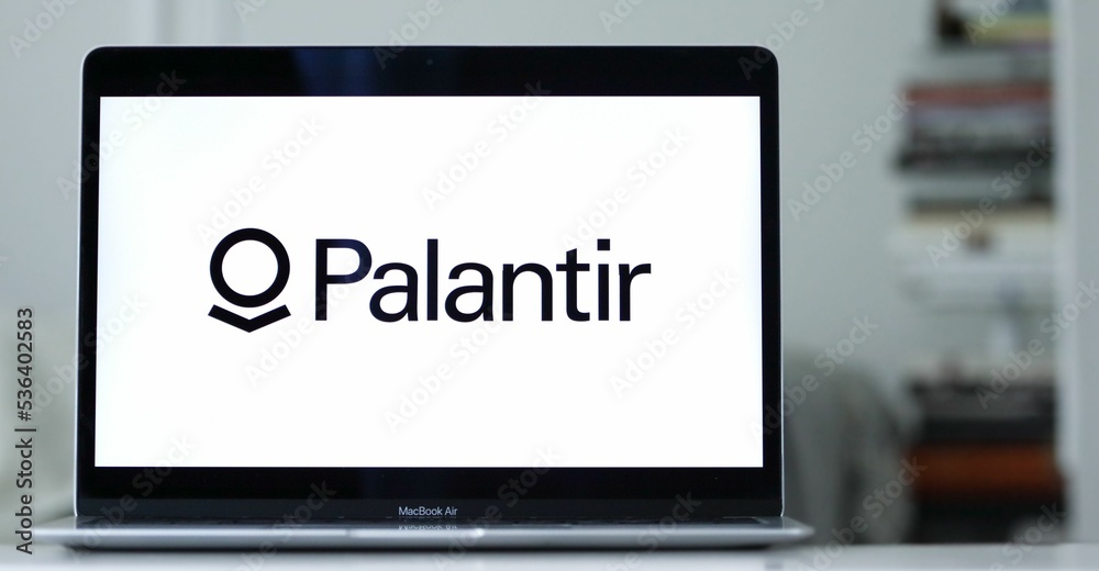 Logo of Palantir displayed on the laptop screen, a big data analytics ...