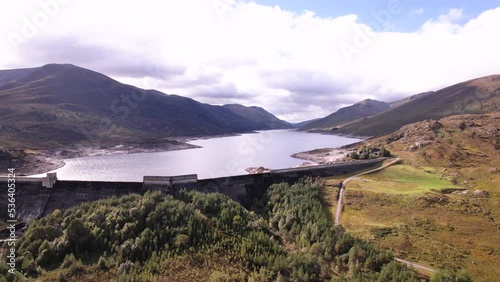 Bird's eye view of a water dam at Loch Mullardoch in Cannich, Scottish Highlands photo