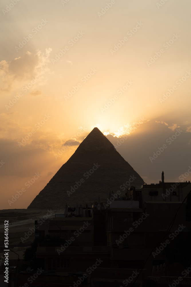 The Sunset Behind an Egyptian Pyramid