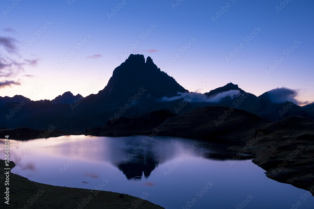 Sunrise at the Ayous Lakes with the Midi dOssau mountain in the background, Pyrenees National Park, France