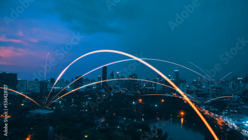 Smart digital city with connection network reciprocity over the cityscape . Concept of future smart wireless digital city and social media networking systems that connects people within the city .