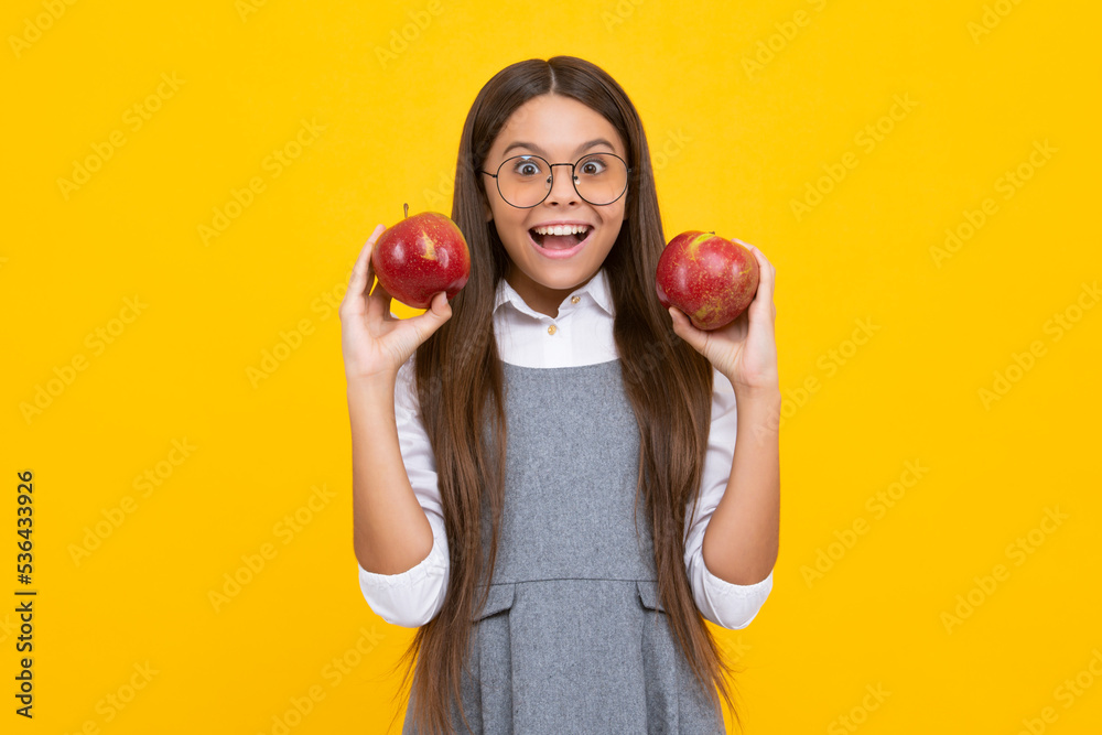 Teen girl child with apple, isolated portrait. Teen girl child with apple, isolated portrait.