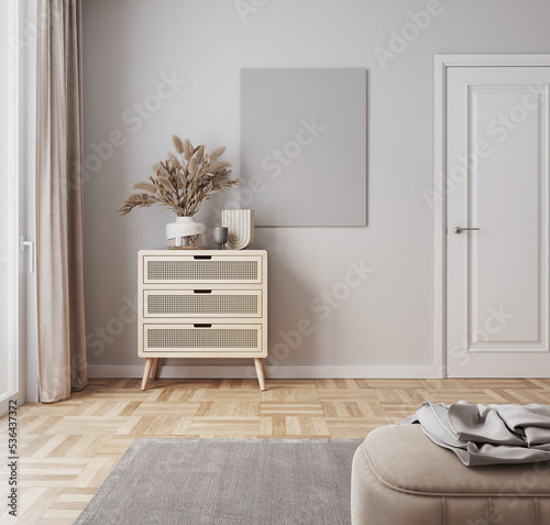 Minimalistic interior design. empty poster frame in modern interior background with boho style dresser and decorations
