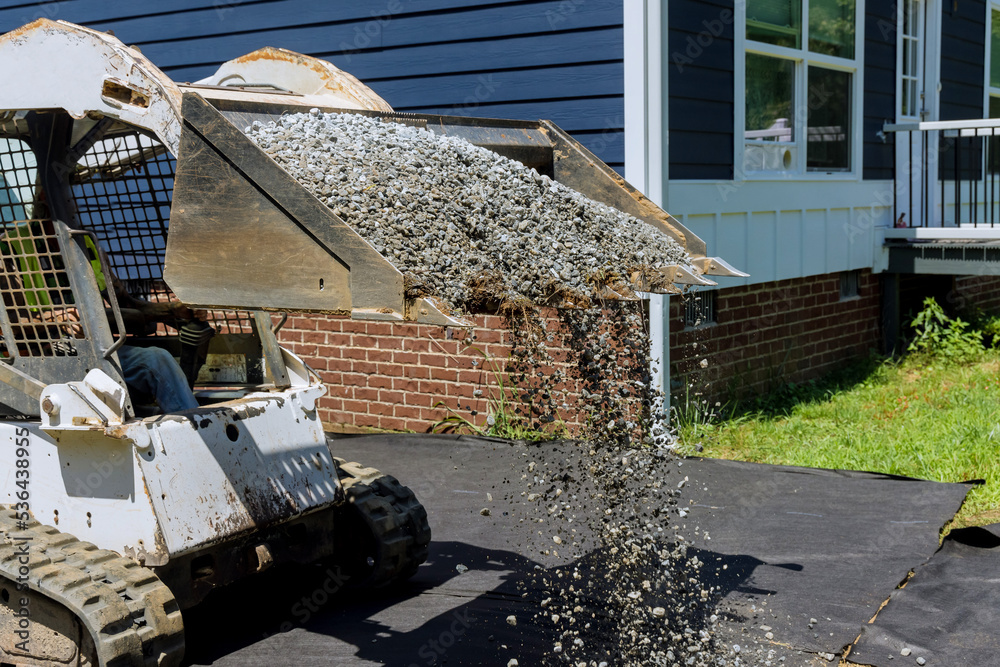 tractor-uploaded-gravel-preparation-of-the-platform-to-install-storage