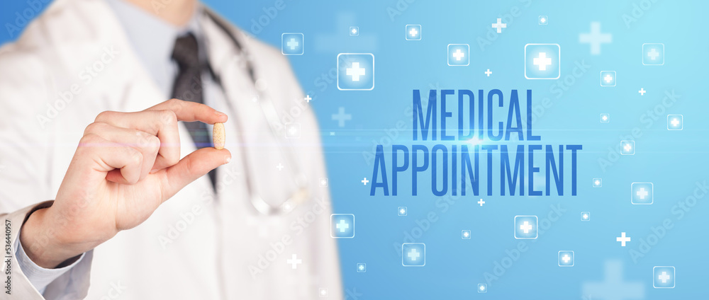 Close-up of a doctor giving a pill Close-up of a doctor giving a pill