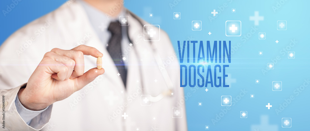 Close-up of a doctor giving a pill Close-up of a doctor giving a pill