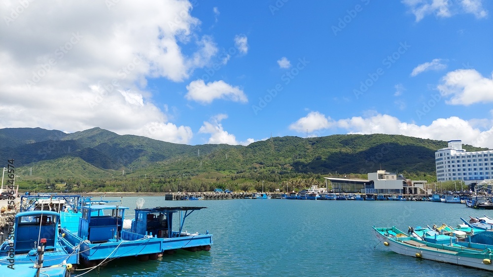fishing port in Pingtung with blue sky and boats design for outdoor activity