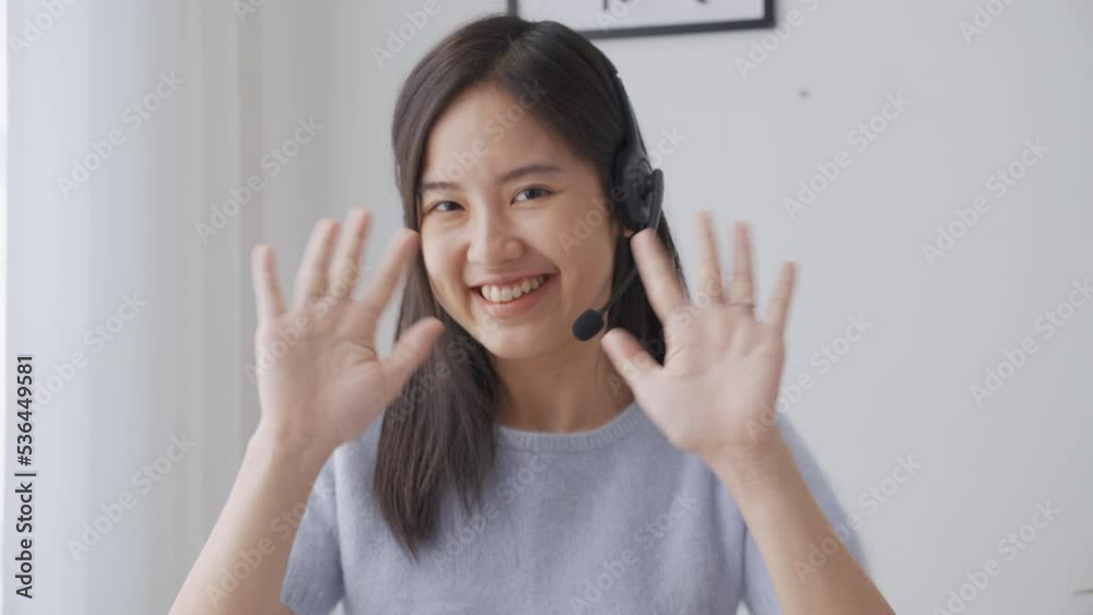 Young asian businesswoman wearing headset video call and presentation for conference online at home, woman meeting and talking for present, one person, business and communication concept.