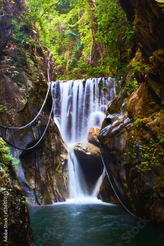 waterfall in jungle forest with water turquoise color in palo maria  puerto vallarta jalisco 