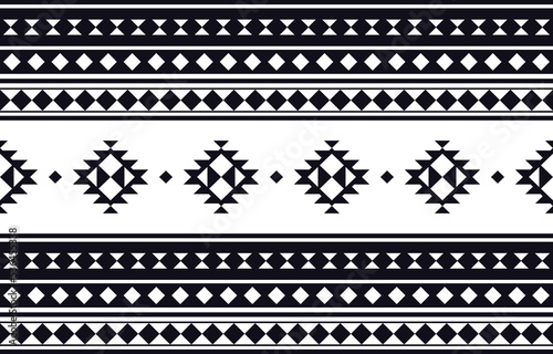 Ethnic patterns. Aztec seamless geometric pattern on white back. Designed for bakcground borders or frames.