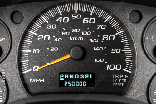 250,000 miles or kilometers on car odometer photo