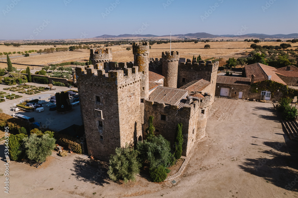 Aerial view of a medieval castle with battlements and vaults.