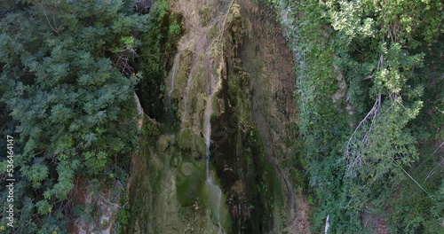Waterfall in a pond in a tropical forest