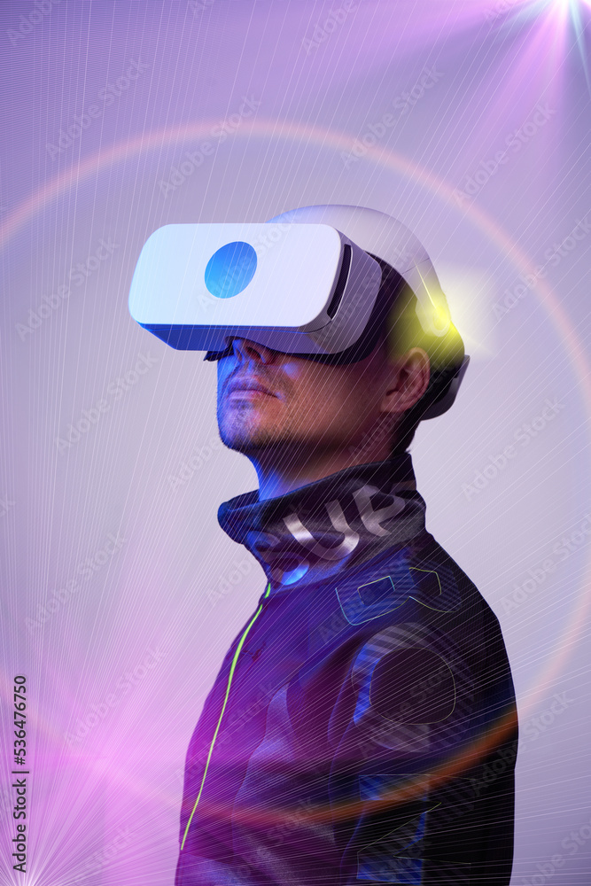 © nuclear_lily - Man is using virtual reality headset. Concept of virtual, augmented and extended reality and metaverse.