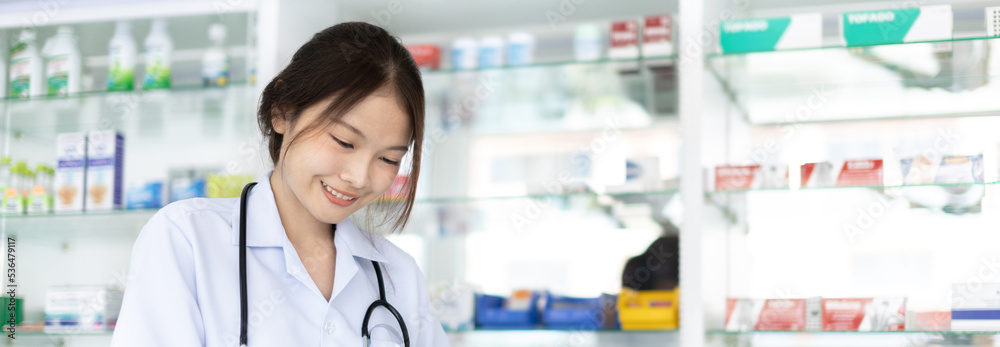 Pharmacist working in a pharmacy, Consultation and medical advice, All kinds of generic household drugs and pharmaceutical products on the shelf, Service and assistance to patients, Pharmacy.