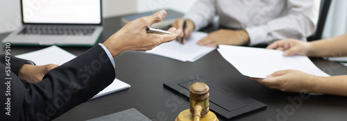 Photography Attorney or judge provides legal advice to the client in the courtroom, Ethics in the courts include justice and impartiality, Legal consultant, Scales of justice, Law hammer, Litigation and justice