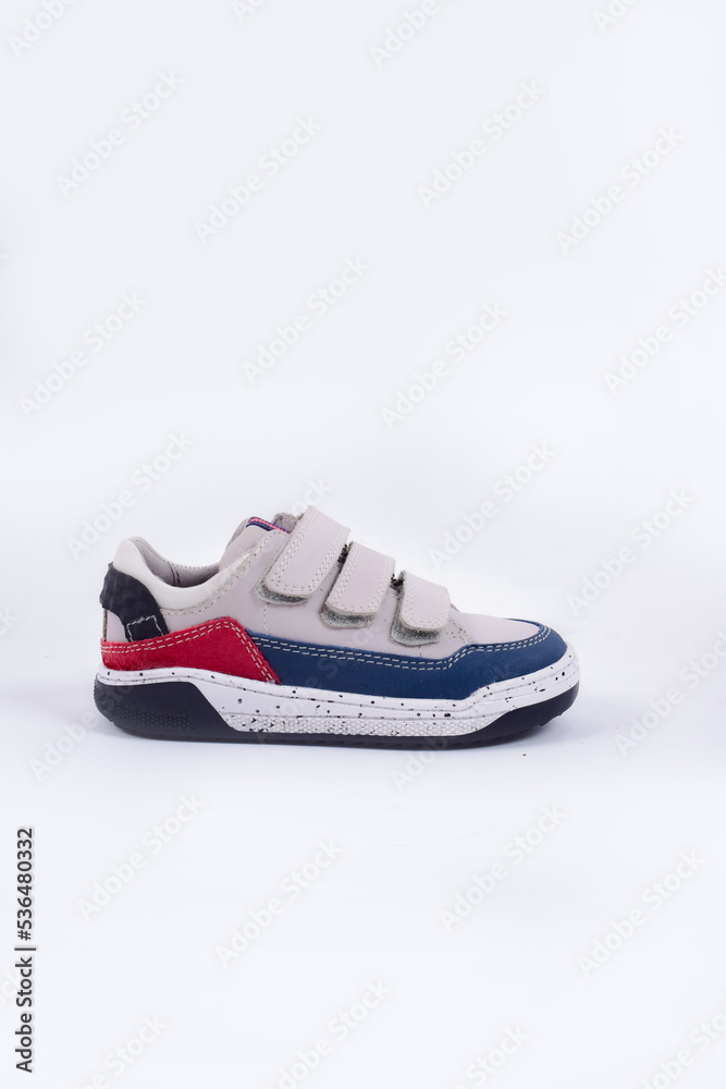 children's shoes color pink on a plain white background children's shoes color pink on a plain white background
