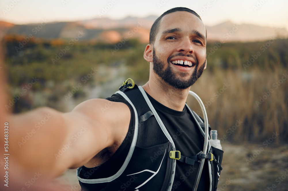 Fototapeta premium Hiking, selfie or travel with man in nature for freedom, social media and mountain forest in Australia holiday adventure. Workout, fitness or health with exercise, blog for summer or wellness sports