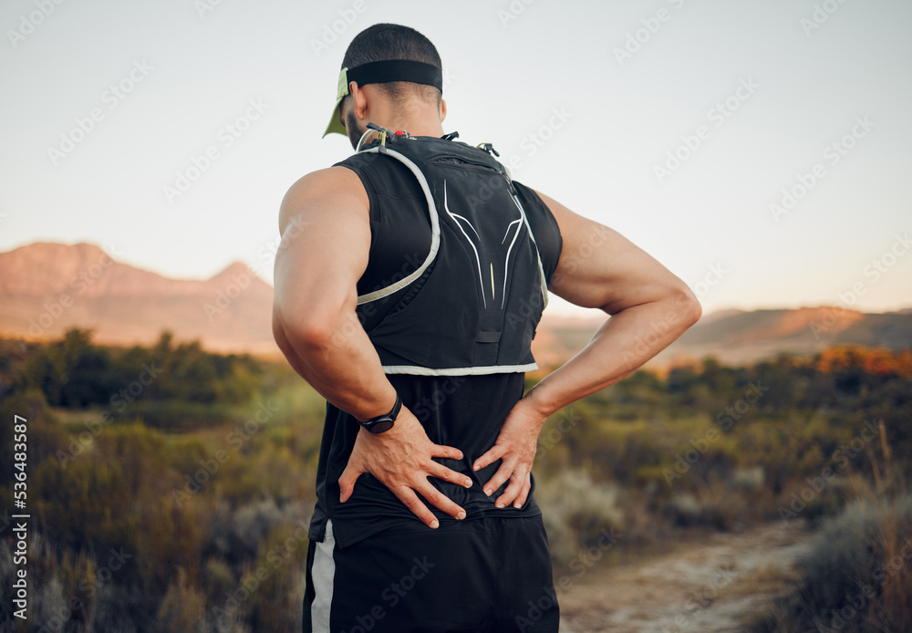 Muscle, injury and back pain after a workout or running outdoor. Man