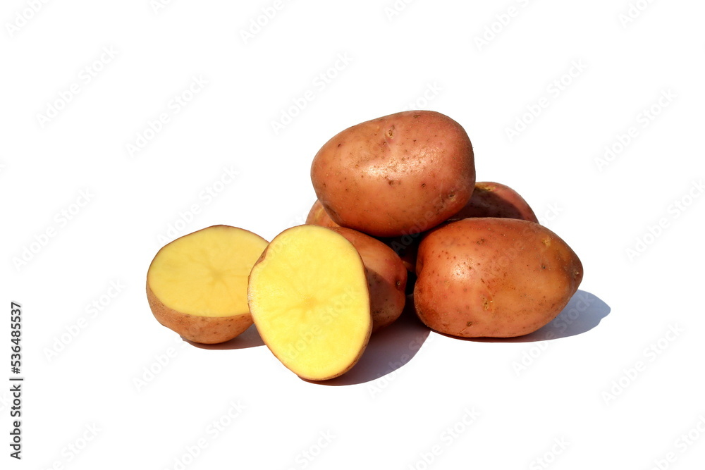 A pile of pink potatoes lies on a white isolated background. A pile of pink potatoes lies on a white isolated background.