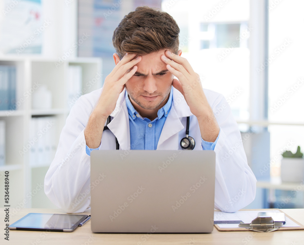 Stress, anxiety or burnout for doctor with laptop working on medicine, medical or healthcare research. Headache, head pain or migraine for hospital employee, worker or career man with digital tech Stress, anxiety or burnout for doctor with laptop working on medicine, medical or healthcare research. Headache, head pain or migraine for hospital employee, worker or career man with digital tech