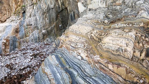 stone background with abstract shapes - Playa del Silencio, Asturias, Spain - October 2022
