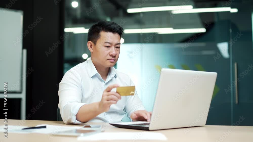 Asian Businessman making Online Payment Failure on laptop computer in Office. Male worker has difficulty problem fail With credit card. Employee could not complete transaction not enough money Asian Businessman making Online Payment Failure on laptop computer in Office. Male worker has difficulty problem fail With credit card. Employee could not complete transaction not enough money