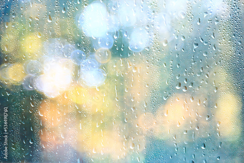 autumn view window raindrops on glass, abstract sad landscape wallpaper © kichigin19