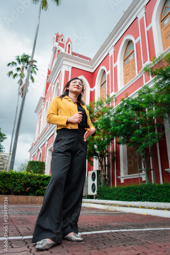 Woman (LGBTQ) posing outdoor fashion style photo