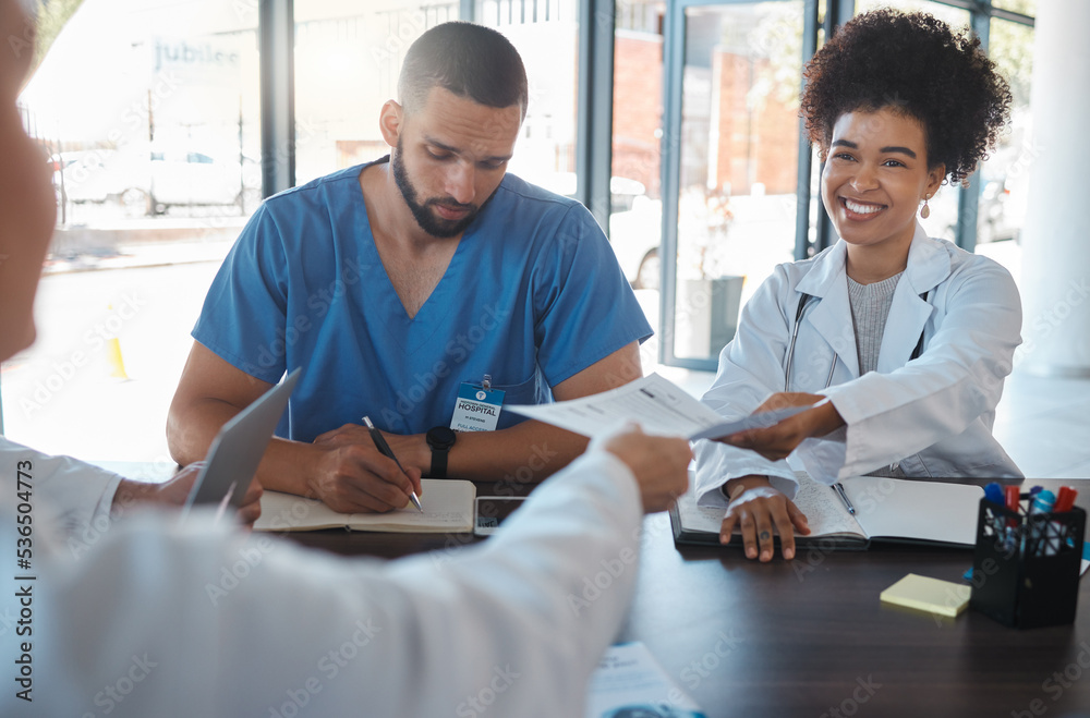 Obraz premium Doctors meeting and hospital planning document for healthcare facility strategy and communication. Professional medicare proposal for medical career workers to review together in boardroom.