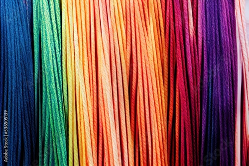 Colorful threads, connected diversity. Concept for companies or social media.
