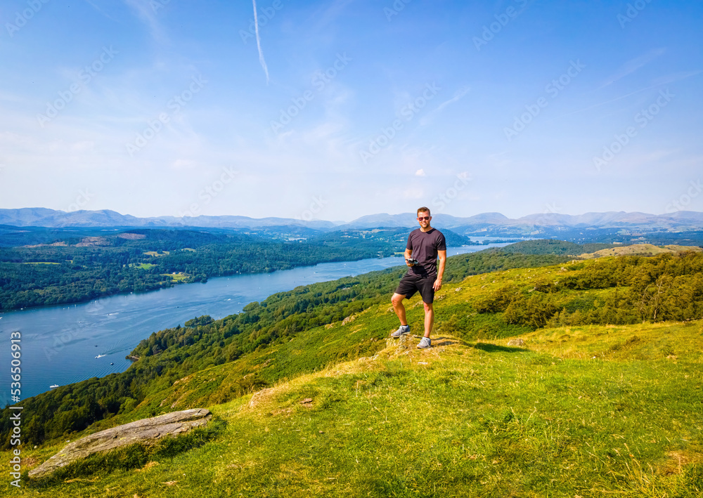 Aerial view of a man on the hike in Windermere in Lake District, a region and national park in Cumbria in northwest England