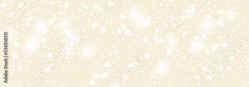 Abstract snowfall in dark sky. Falling white snow winter on light yellow grey sky background. Pastel soft color