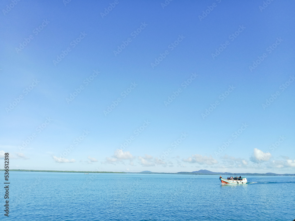 boat on the sea ocean with blue sky background