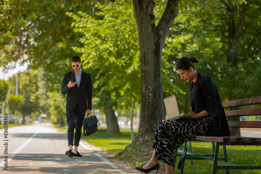 Fototapeta premium A businesswoman is working outside