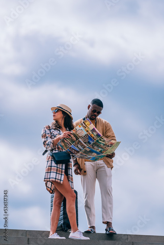Nice multiethnic couple is trying to get home © qunica.com