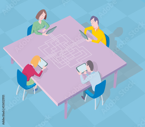 four people meeting in a office at a table communicating