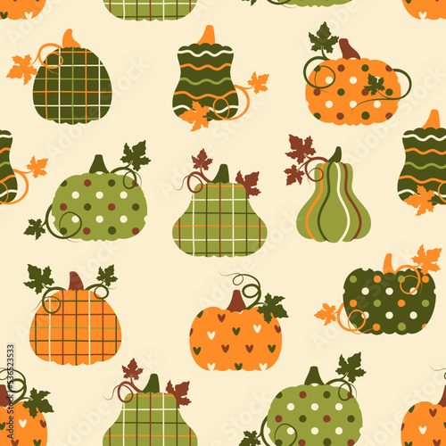 Seamless pattern with patchwork pumpkins with different prints on them. Vector illustration.