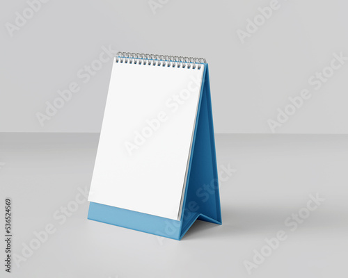 Portrait table calendar mockup with blue stand isolated on white background. 3D Illustration