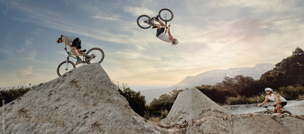 Obraz premium Bmx cyclist, fitness or stunt jump air performance on Australian track or nature park trail in cycling exercise or training. Extreme sports, danger risk or mountain bike man in energy freedom workout