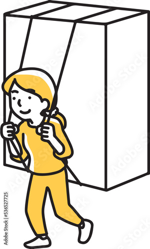 大きな箱を運ぶ女性