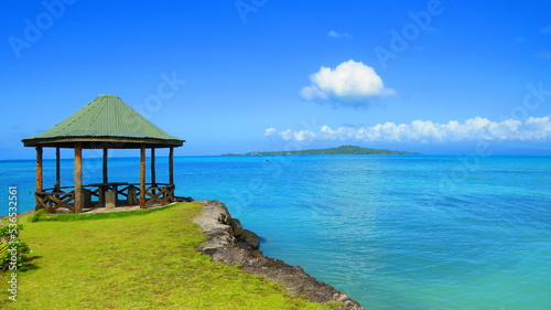A Pavilion in Samoa with view on the pacific ocean and an island