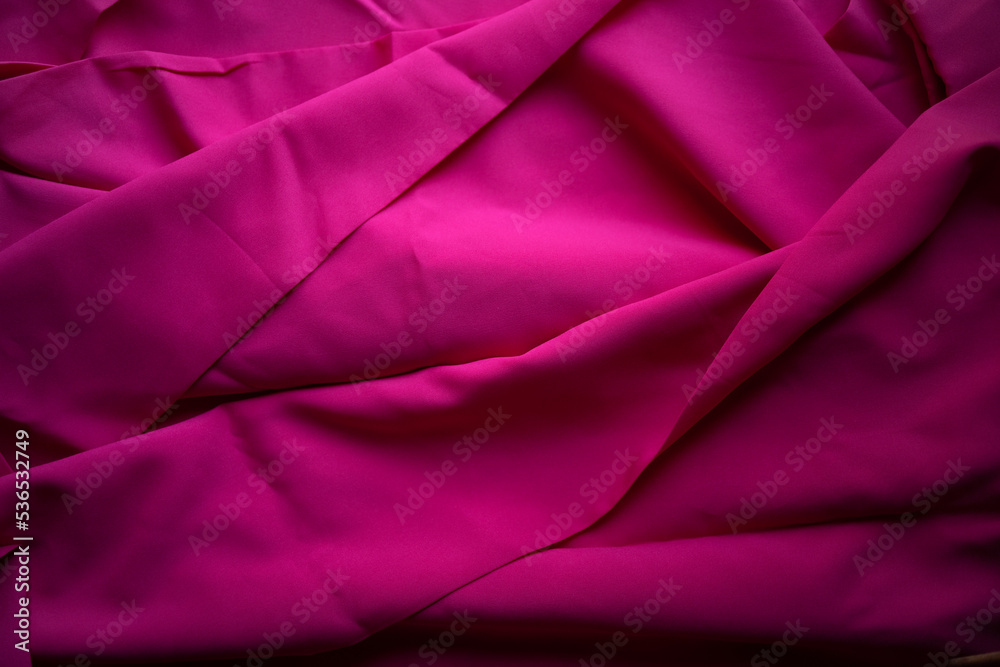 Obraz premium The fabric is pink. Pink background for decoration. Sale of textiles for the home.