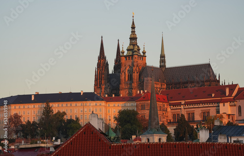 Sunrise over Prague Castle and Saint Vitus Cathedral, amazing warm autumn light early in the morning. Travel to Czech republic.