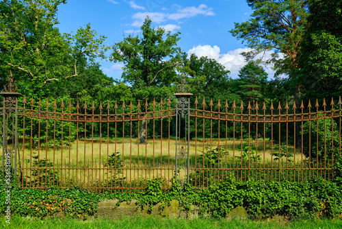 Historic iron fence, external view of Sanssouci Park, Potsdam, Brandenburg, Germany.