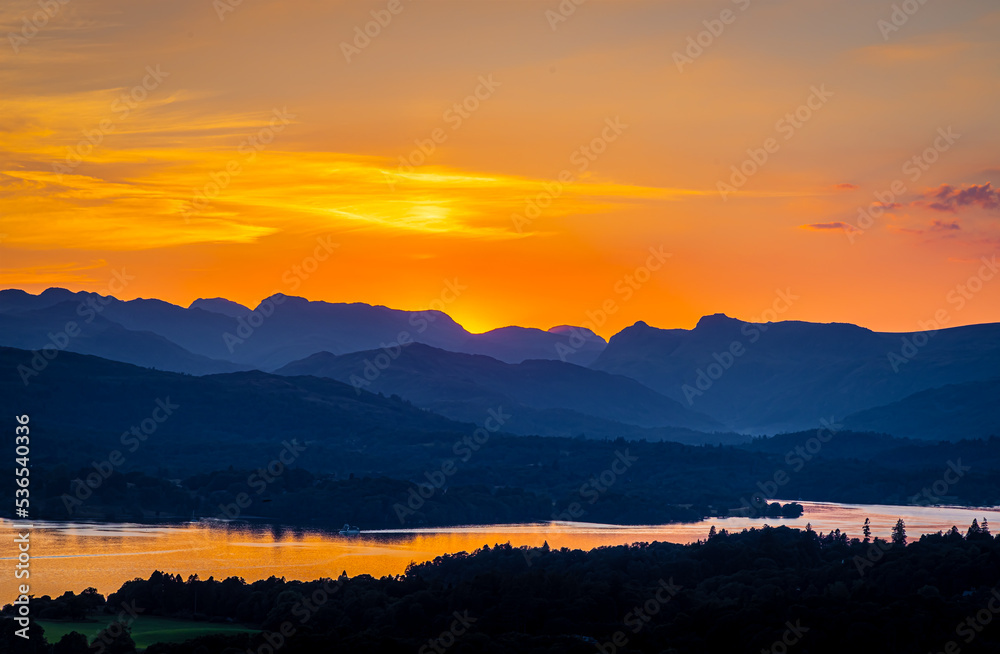 View of sunset over Windermere in Lake District, a region and national park in Cumbria in northwest England