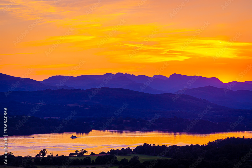 Fototapeta premium View of sunset over Windermere in Lake District, a region and national park in Cumbria in northwest England