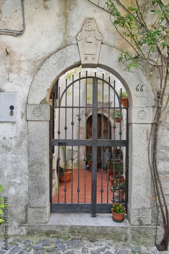 The door of an old house in Pizzone, a medieval village in the Molise region of Italy. photo
